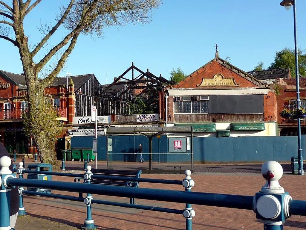 The former Co-operative Society central store, a long parade of shops in an English town