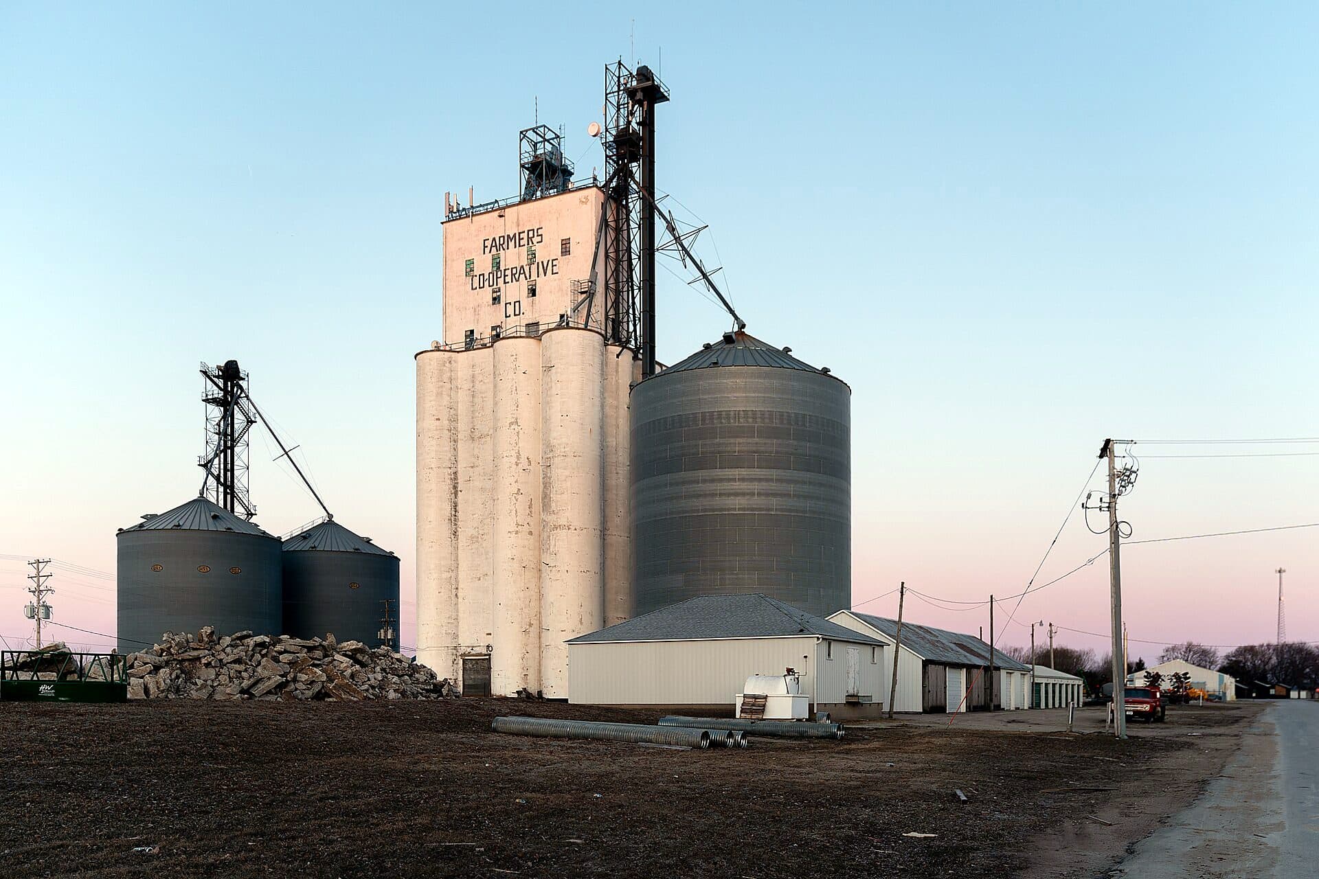 A Farmers Cooperative grain elevator and storage bins in Dike, Iowa